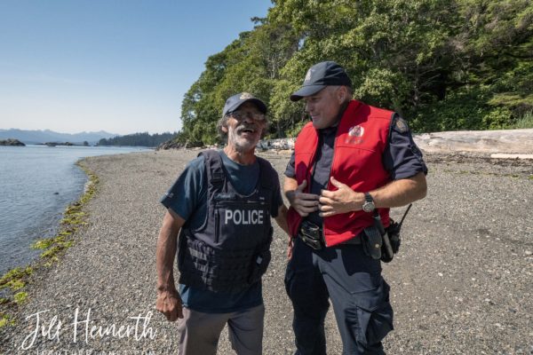 Haida Guardian Sheldon swaps vests with Corporal John Stringer in a moment of levity.