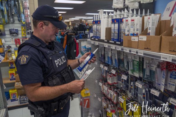 Constable Mike Reid stops into a hardware store in Prince Rupert, searching for the right glue to repair a RHIB.